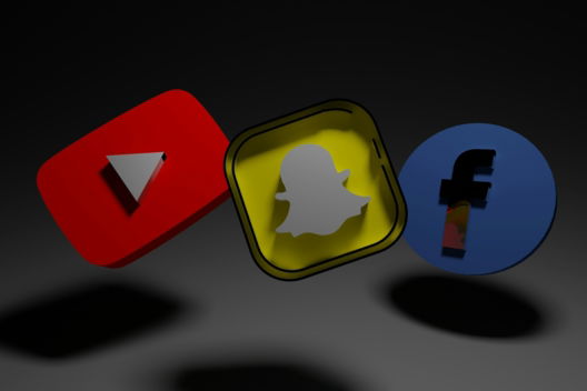 a-group-of-three-different-colored-objects-on-a-black-background.jpg a group of three different colored objects on a black background